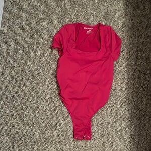 Hot pink body suit new worn once brand one step up